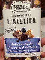 L'Atelier chocolate negro, arándanos azules, almendras y avellanas