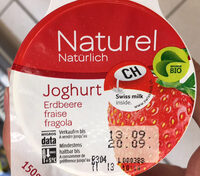 Naturel Yogourt avec fraises de graisse dans la parie lactique