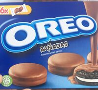 Galletas de chocolate rellenas de crema bañadas