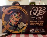 Riso nero al curry con mazzancolle, piselli e zucchine