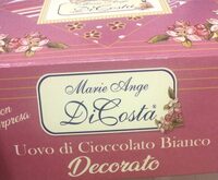 Uovo di cioccolato bianco decorato