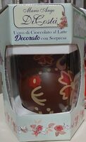 Uovo  di cioccolato al latte decorato con sorpresa