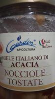 Miel italiana di acacia nocciole tostate