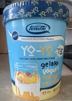 Yogurt Ice Cream With Mango And Passion Fruit Syrup