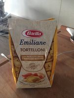 Emiliane tortelloni crudo e parmigiano