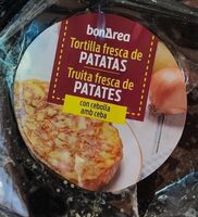 Tortilla fresca de patata con cebolla