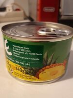 Piña en rodajas en su jugo