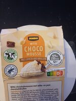 Witte choco mousse met chocolade krullen