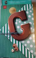 Lettre G en Chocolat au lait aux noisettes