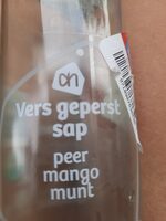 Versgeperst sap peer mango munt